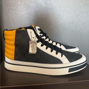 Gucci authentic high-top sneakers featuring the signature GG monogram